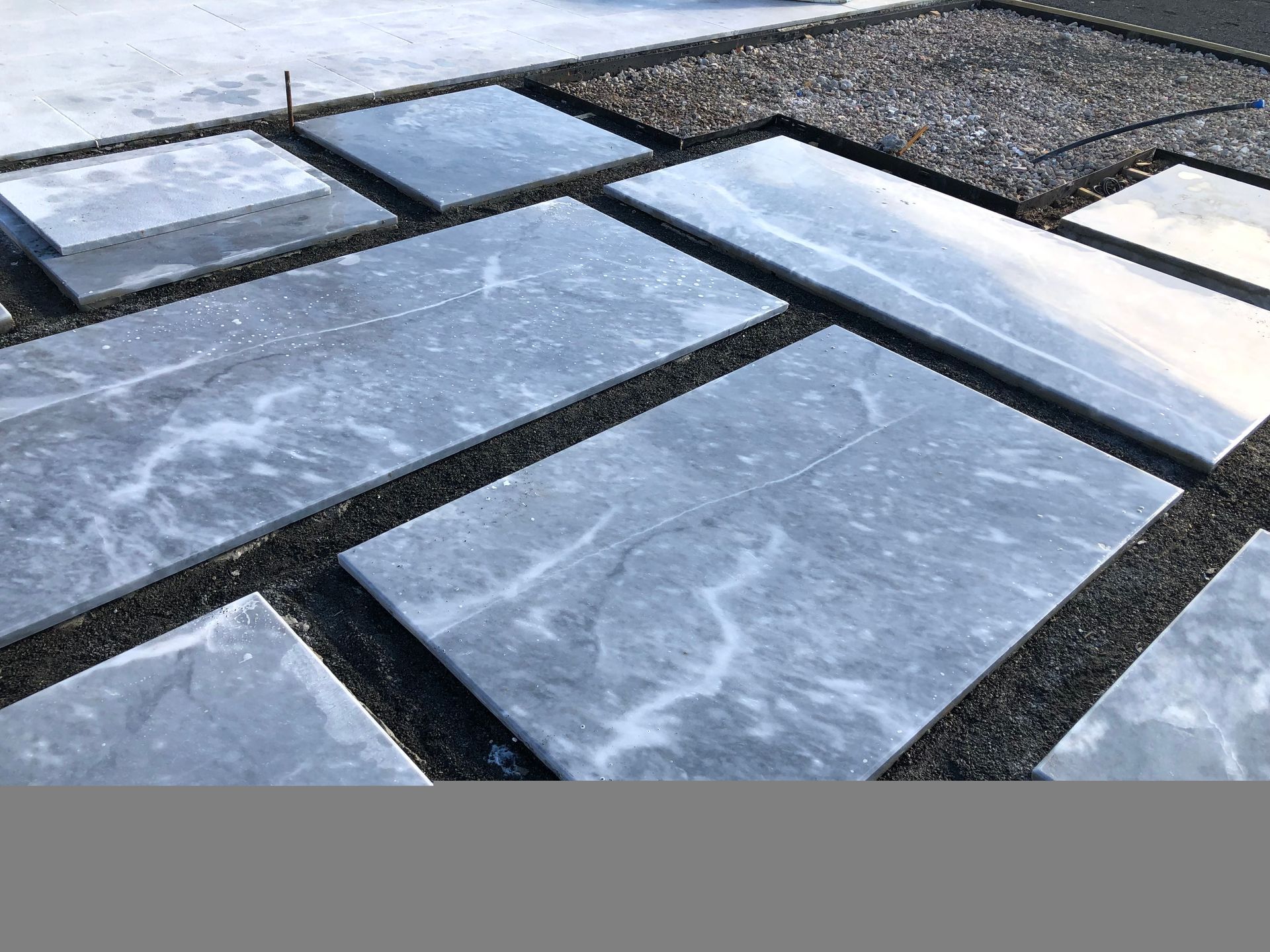 There are many different types of tiles on the ground.