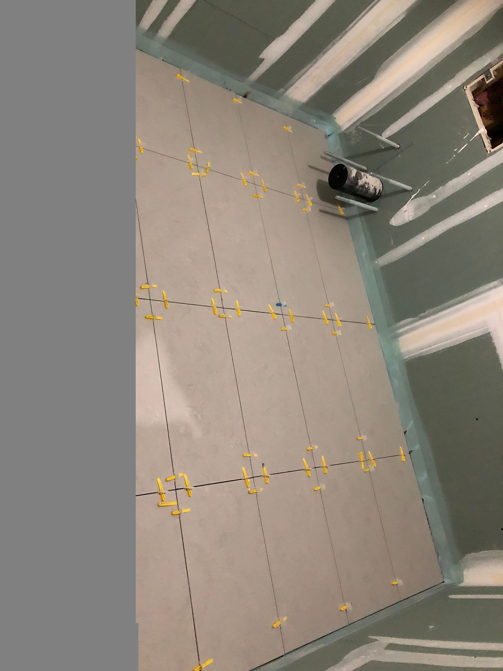 A room with a lot of tiles on the floor