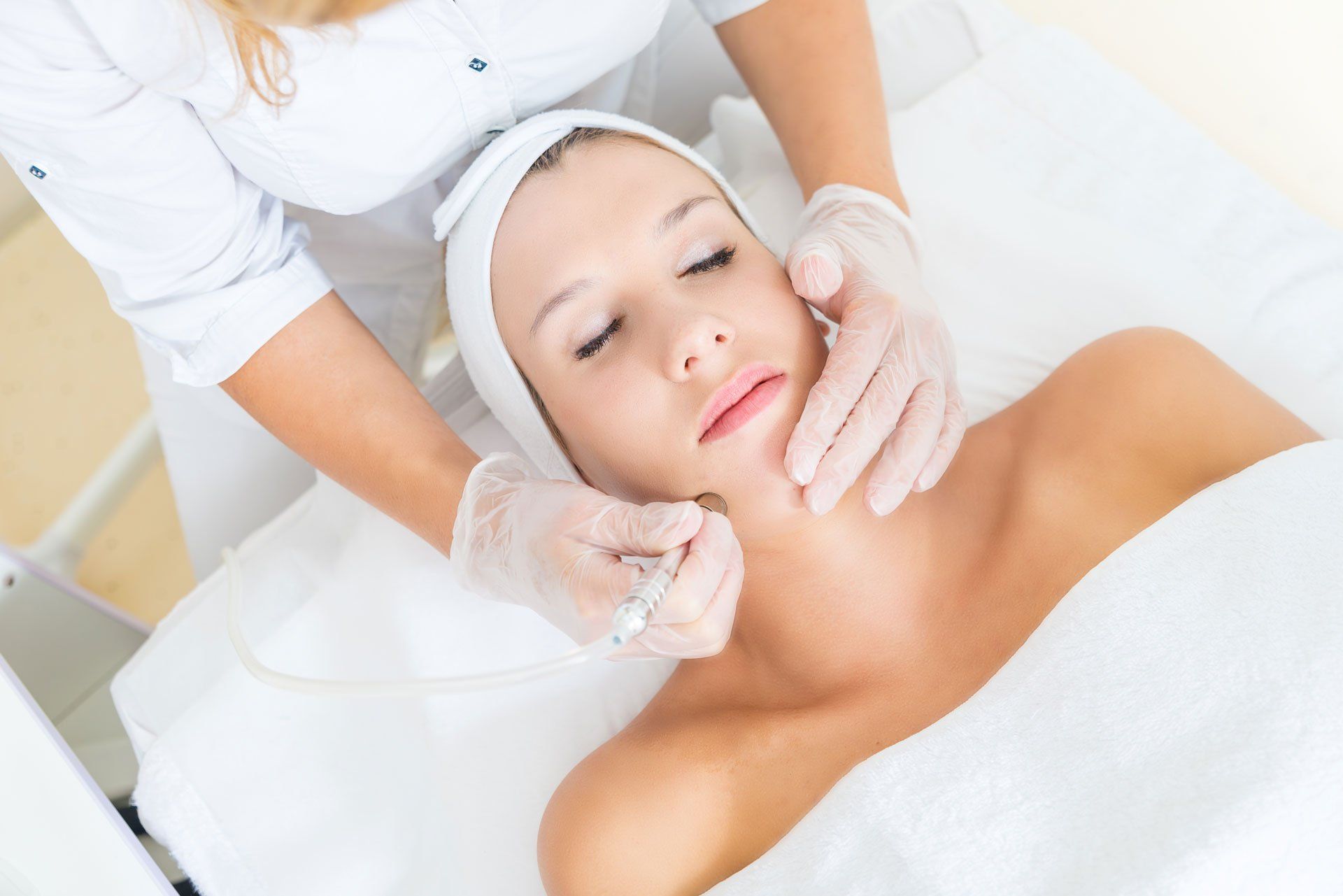 Woman Dermaplaning — Laramie, WY — Revitalize Wellness & Spa LLC