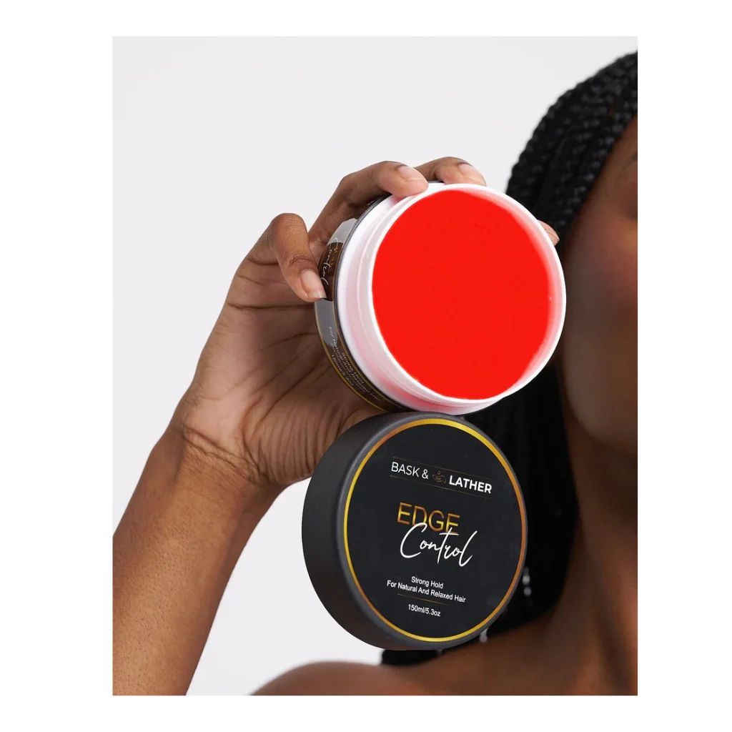 Person holding two jars of