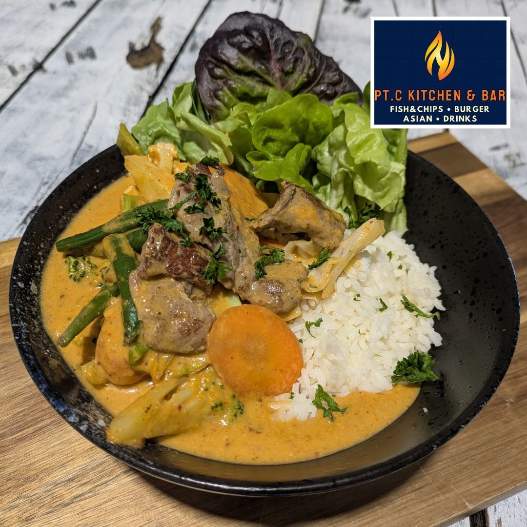 Curry With Rice and Vegetables, Served With Lettuce — Pt Cartwright Seafoods in Warana, QLD