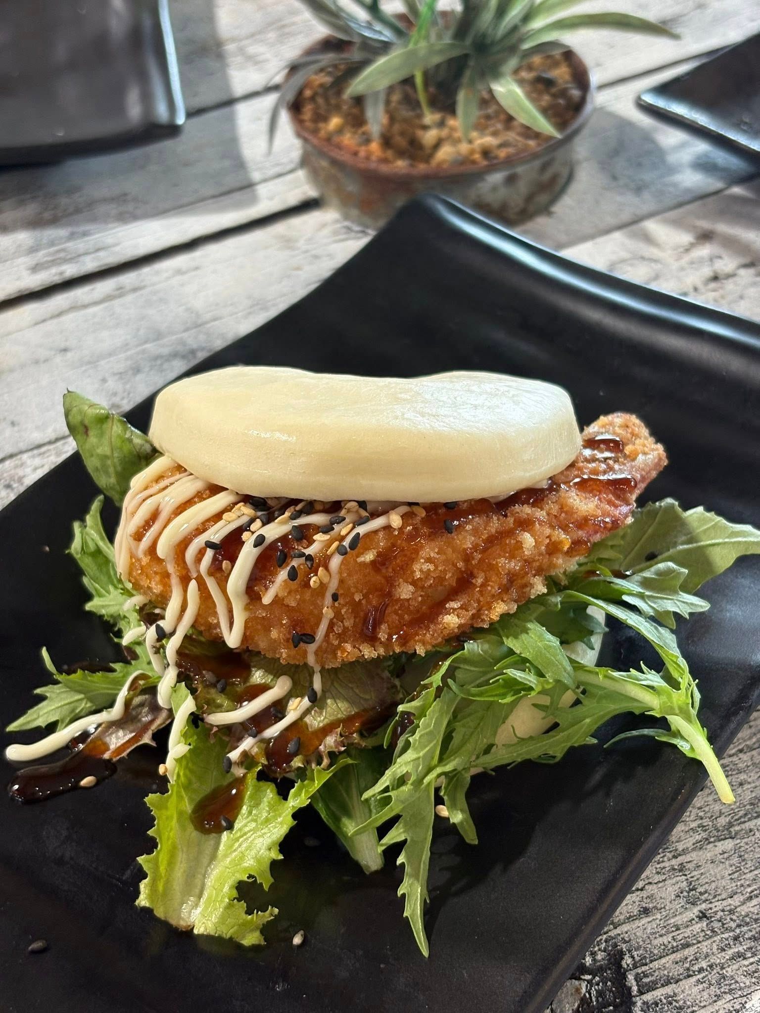 Crumb Prawn Bao Bun — Pt Cartwright Seafoods in Warana, QLD