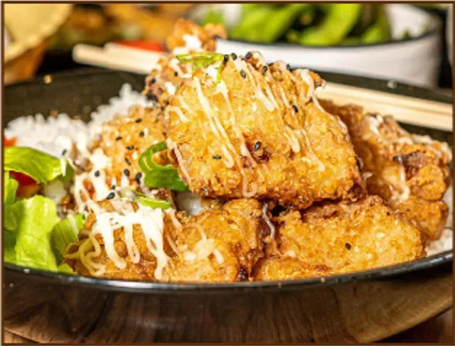 Fried Chicken Pieces With Sauce, Sesame Seeds — Pt Cartwright Seafoods in Warana, QLD