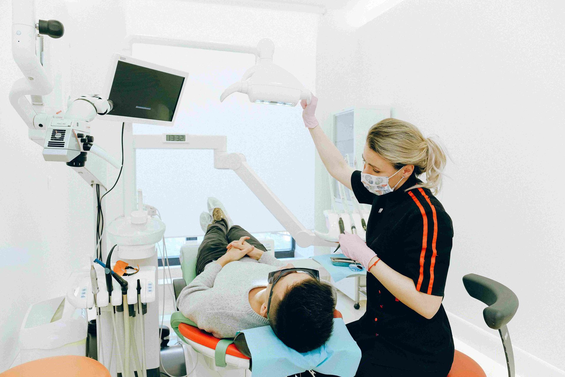 Dentist attending her patient