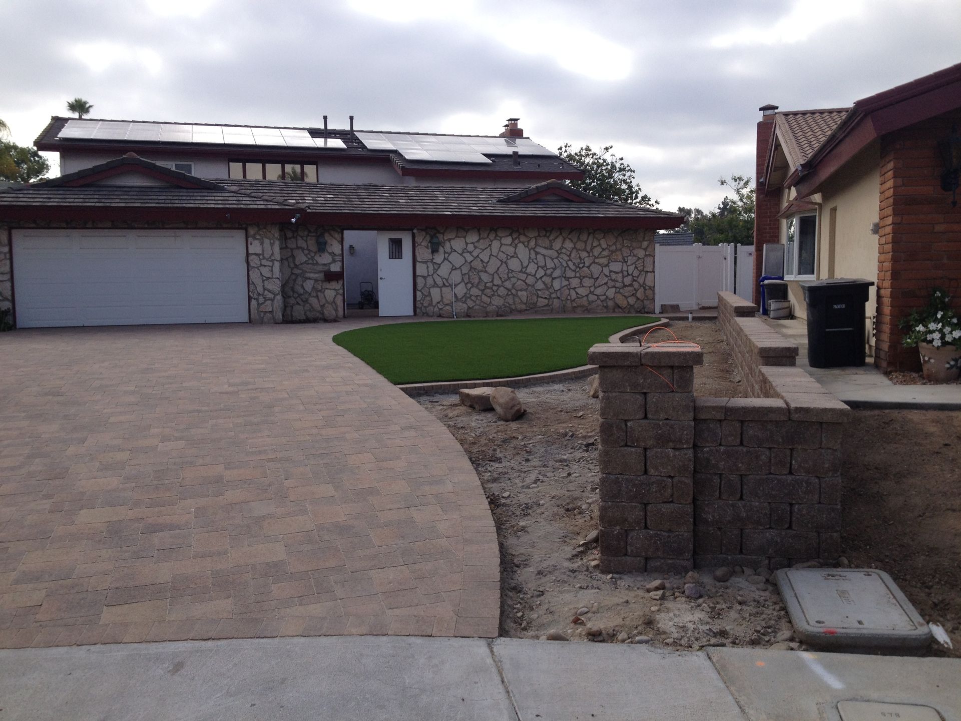 A residential exterior featuring a paved driveway.