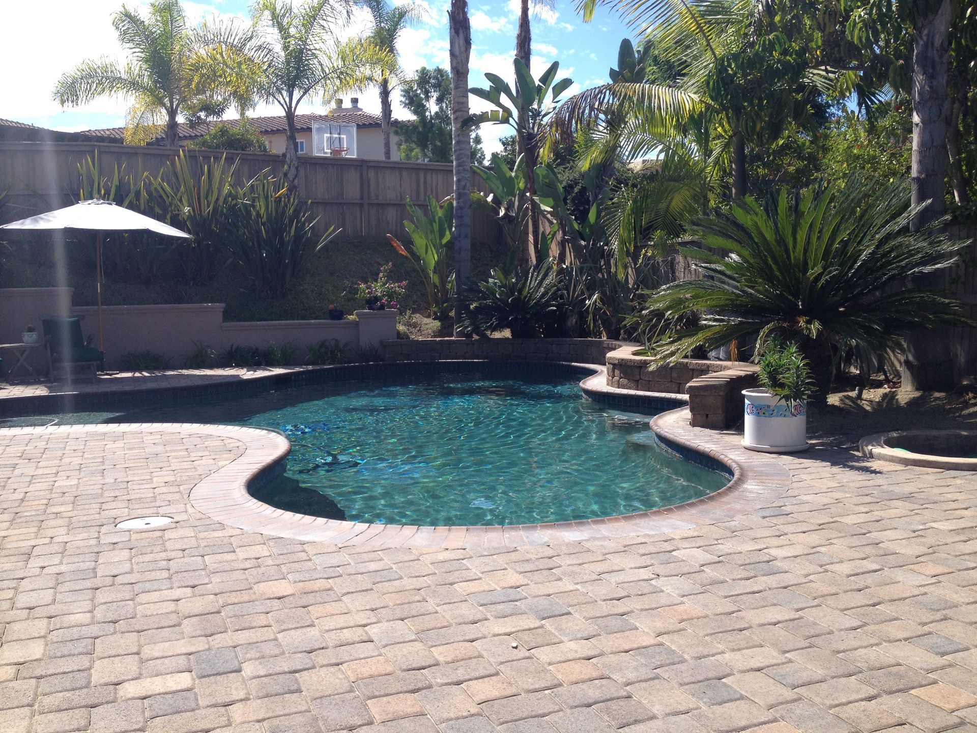 A swimming pool with dark blue water.