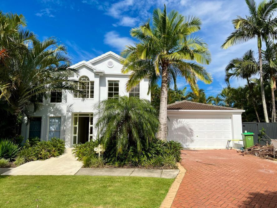 A White House With Palm Trees in Front of It — TMM Painting in Coolangatta, QLD