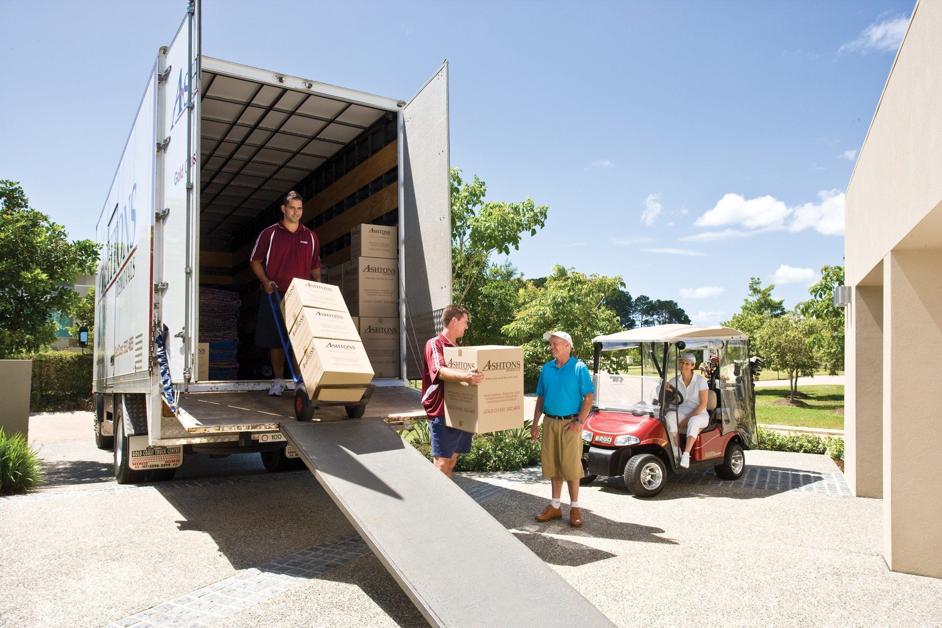 Man Transferring a Box | Molendinar, Qld | Ashtons Removals