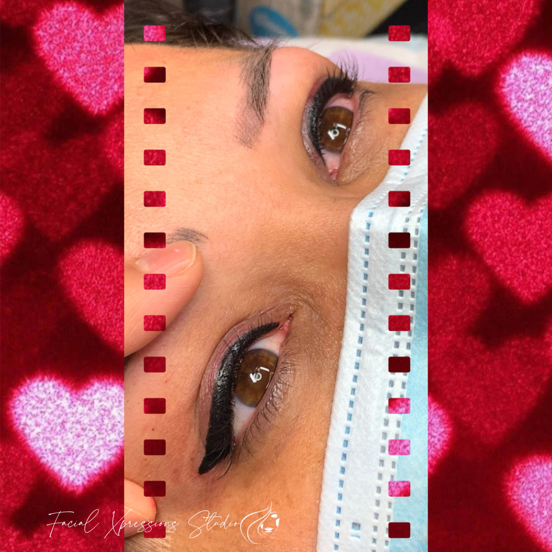 A close up of a woman 's face with hearts in the background