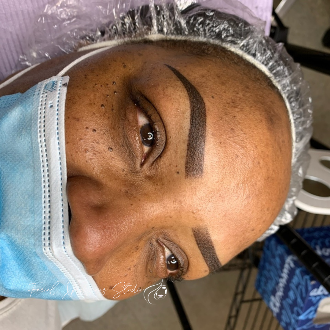 A close up of a woman wearing a mask and a plastic cap.