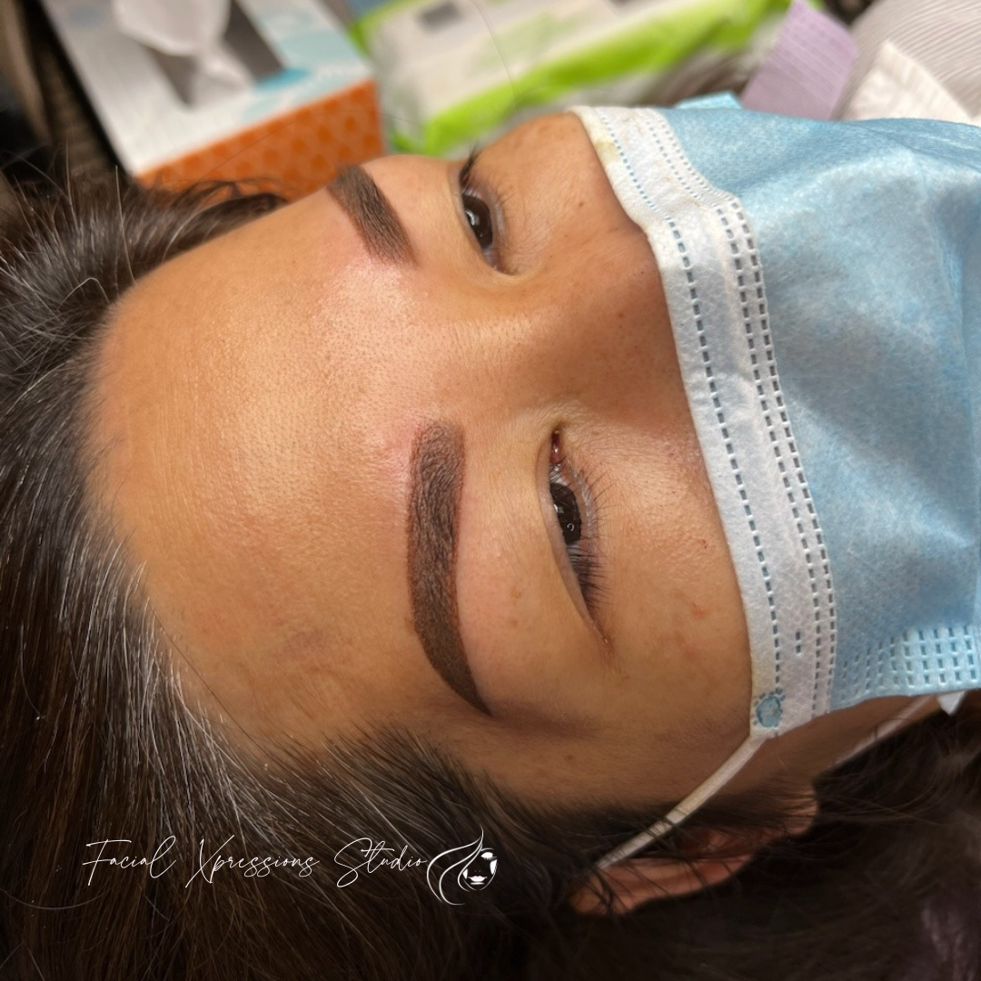 A woman is wearing a mask on her face.