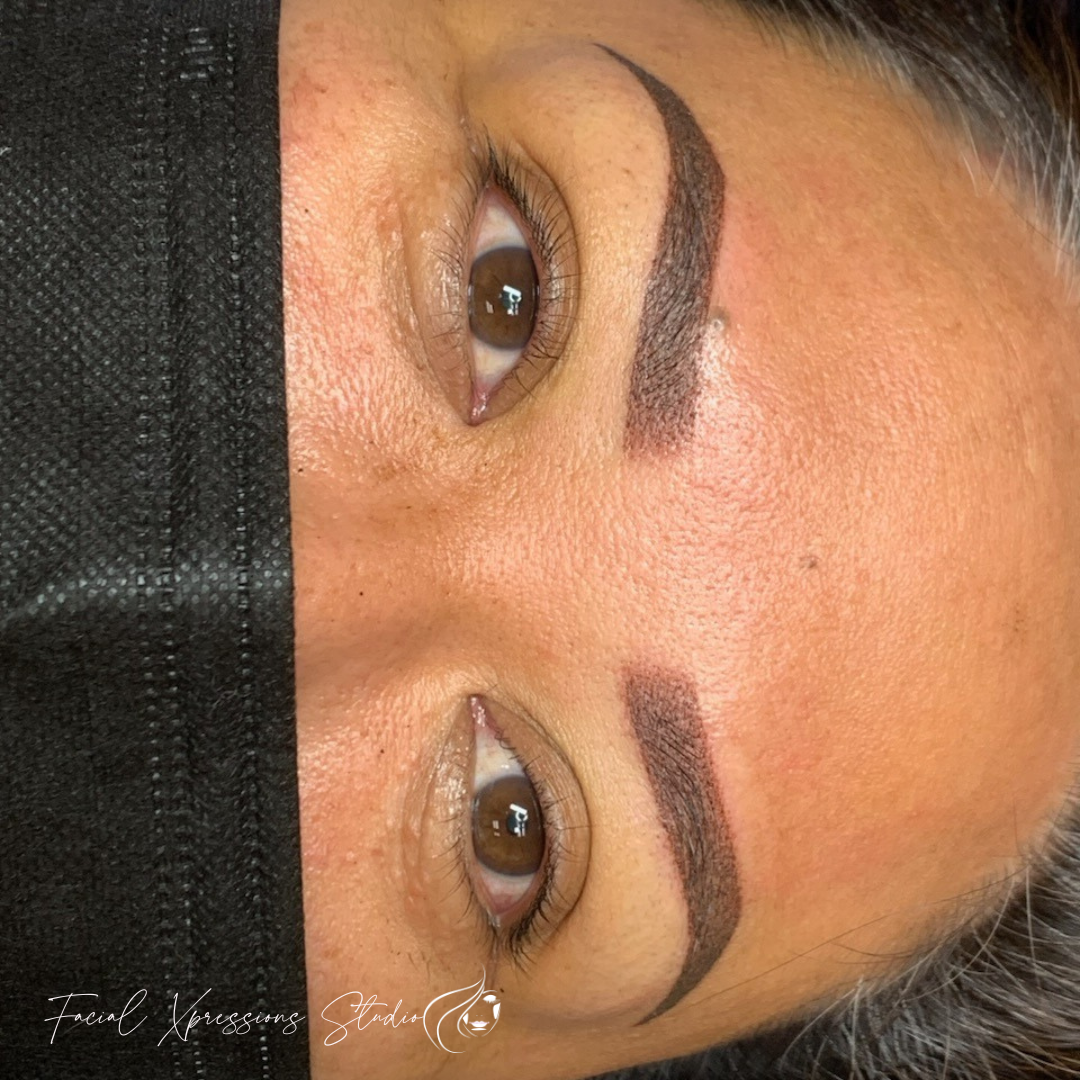 A close up of a woman 's face with a mask on.
