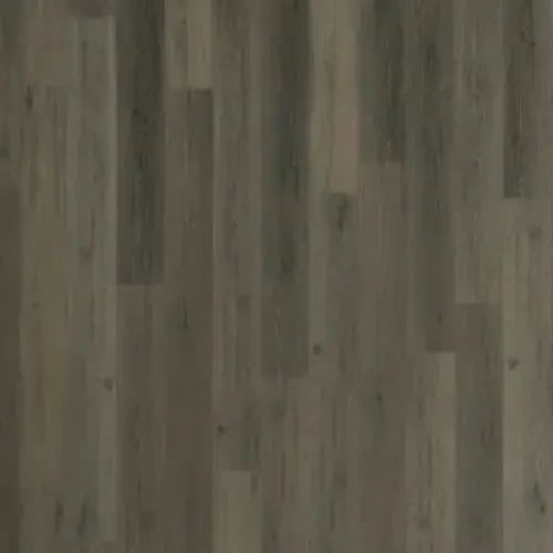 A pattern of wood-look vinyl planks in varied shades of cool gray and muted brown with subtle grain and knot details.