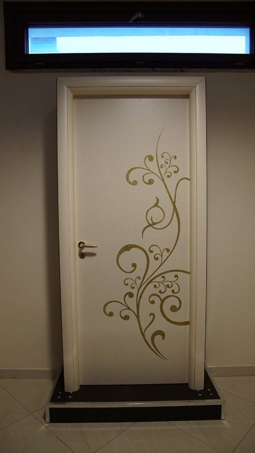 vendita porte bianche decori in oro