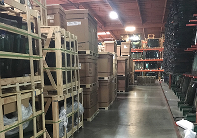 A warehouse filled with lots of boxes and pallets