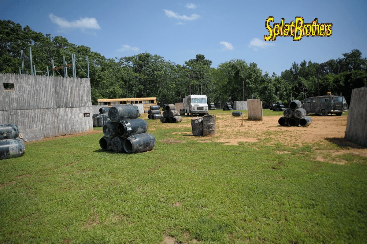 A paintball field with a sign that says stealth bunkers