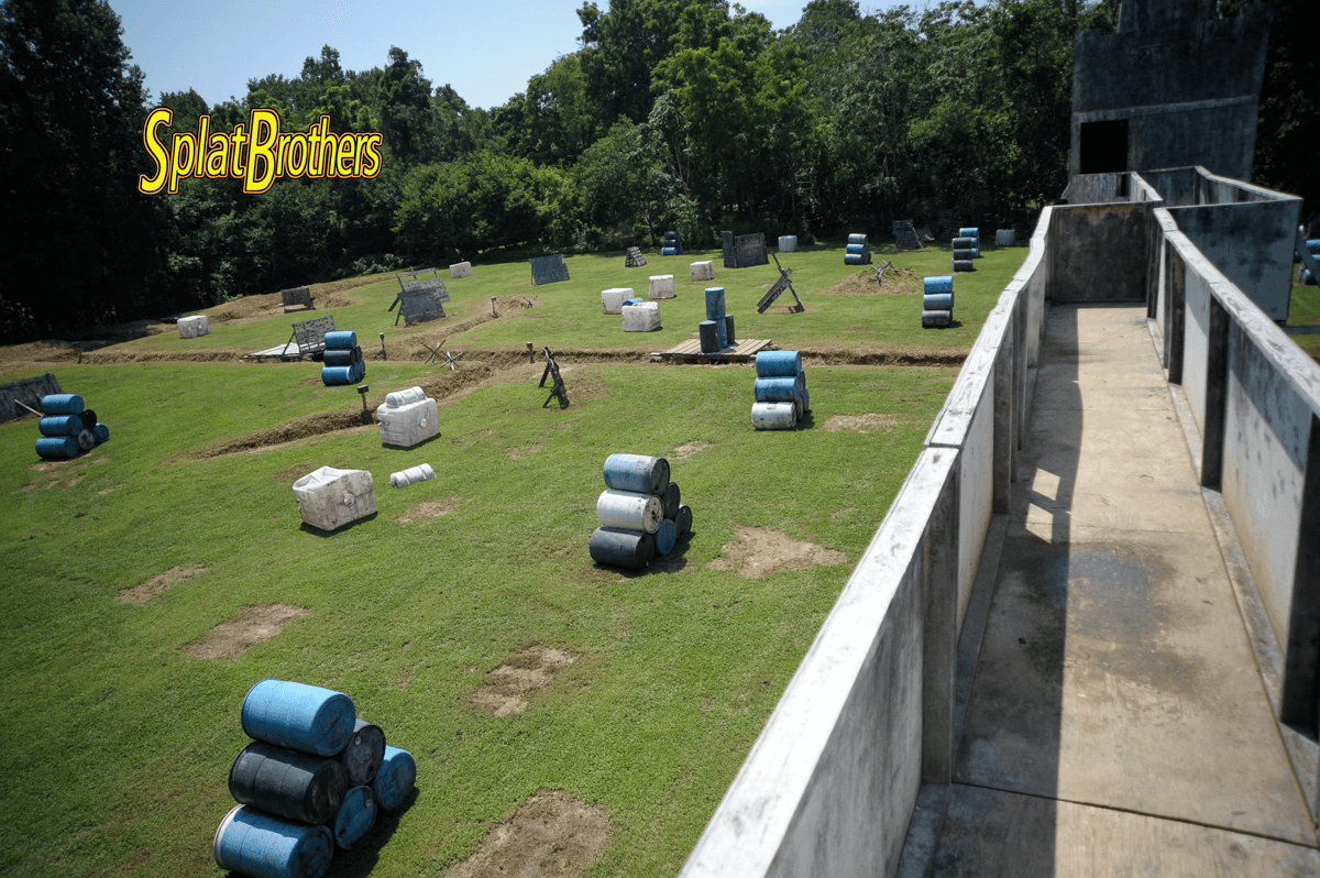 A paintball field with a sign that says splat brothers