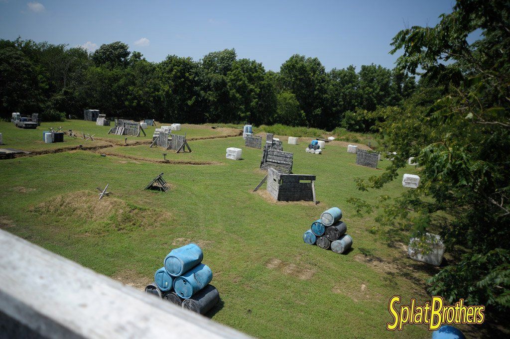 A paintball field with the words splat brothers on the bottom