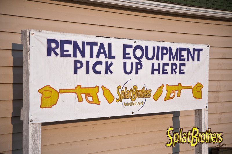 A sign that says rental equipment pick up here