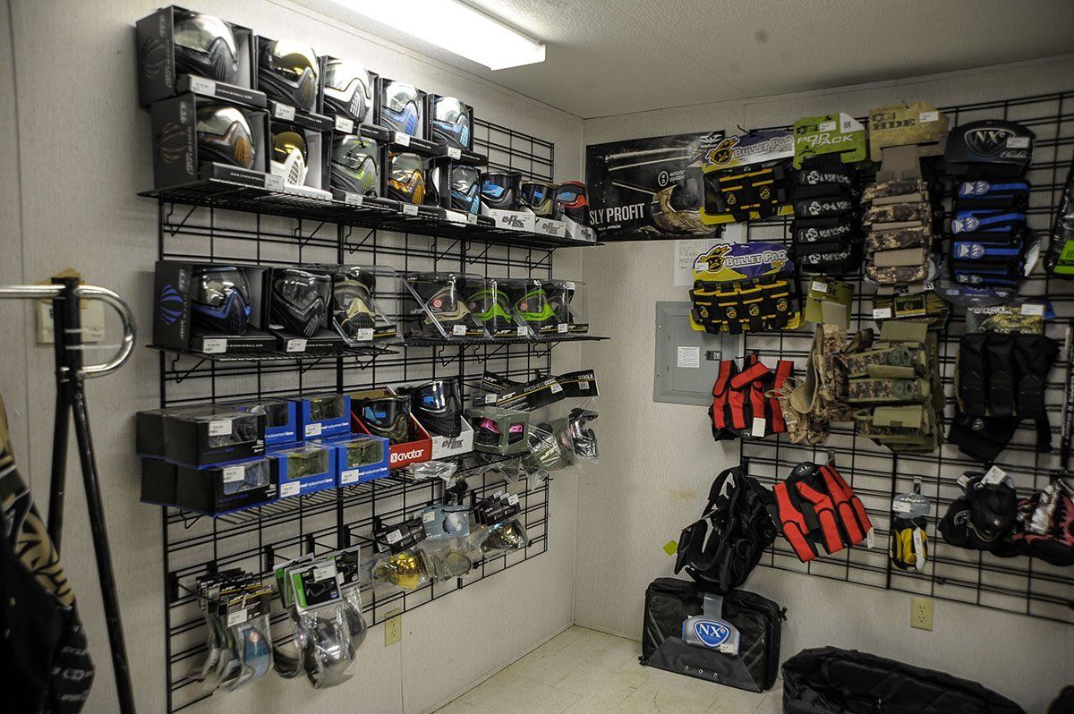 A store filled with lots of items including helmets and gloves