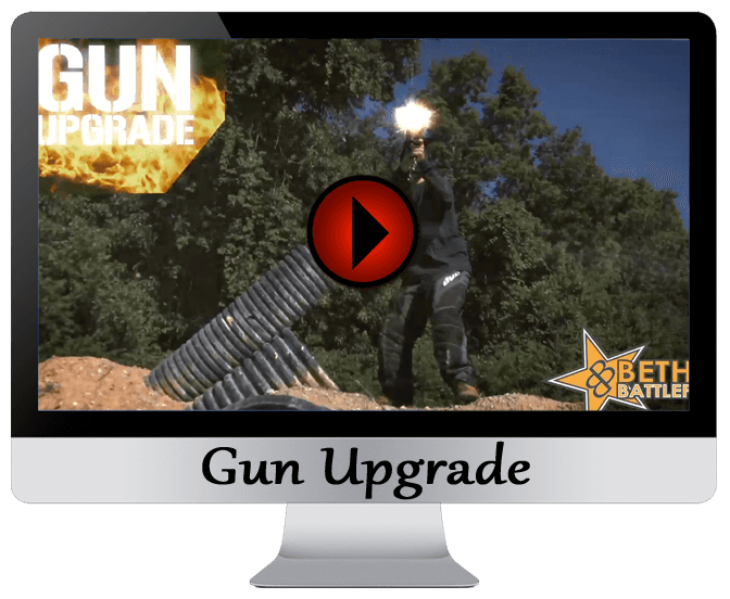 A person fires a gun outdoors, with a large blast of fire. The title “Gun Upgrade” is displayed.