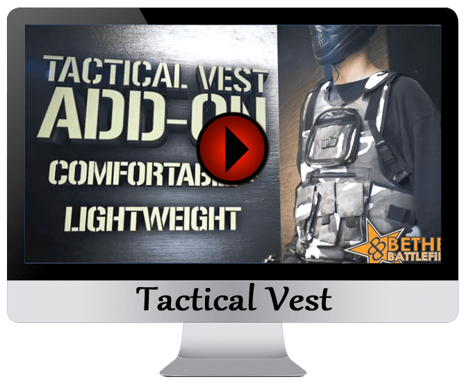 A computer screen shows a video about a tactical vest