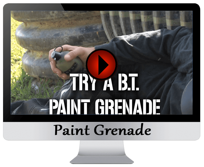 Person holding a paint grenade, ready to throw. Text on screen: