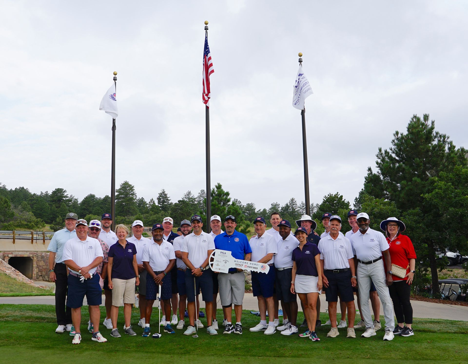 Pictured: U.S. Army Specialist Daniel Scipioni center, surrounded by PGA REACH Colorado Foundation Trustees.