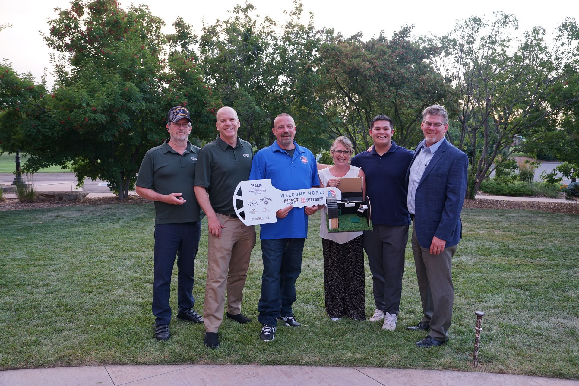 Pictured: U.S. Army Specialist Daniel Scipioni receiving his ceremonial key to his new home.