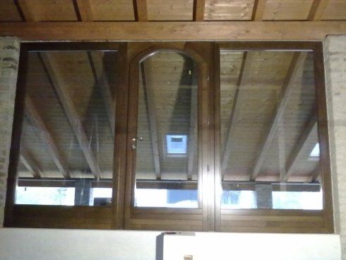 porta finestra ad arco in legno massello