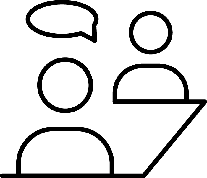 Two figures on a computer screen in a video call; one with a speech bubble.