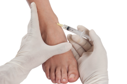 Gloved hands giving a foot injection; a syringe is inserted into the top of the foot.