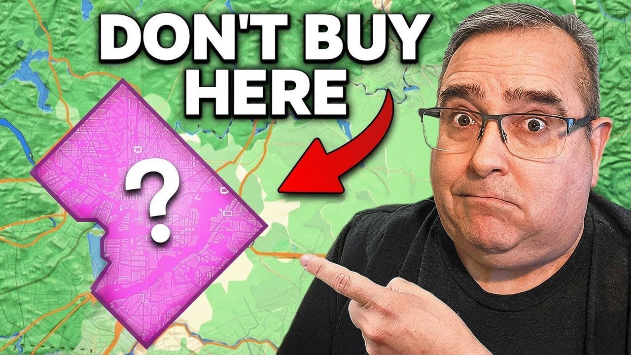 Man points at a map with a pink area labeled