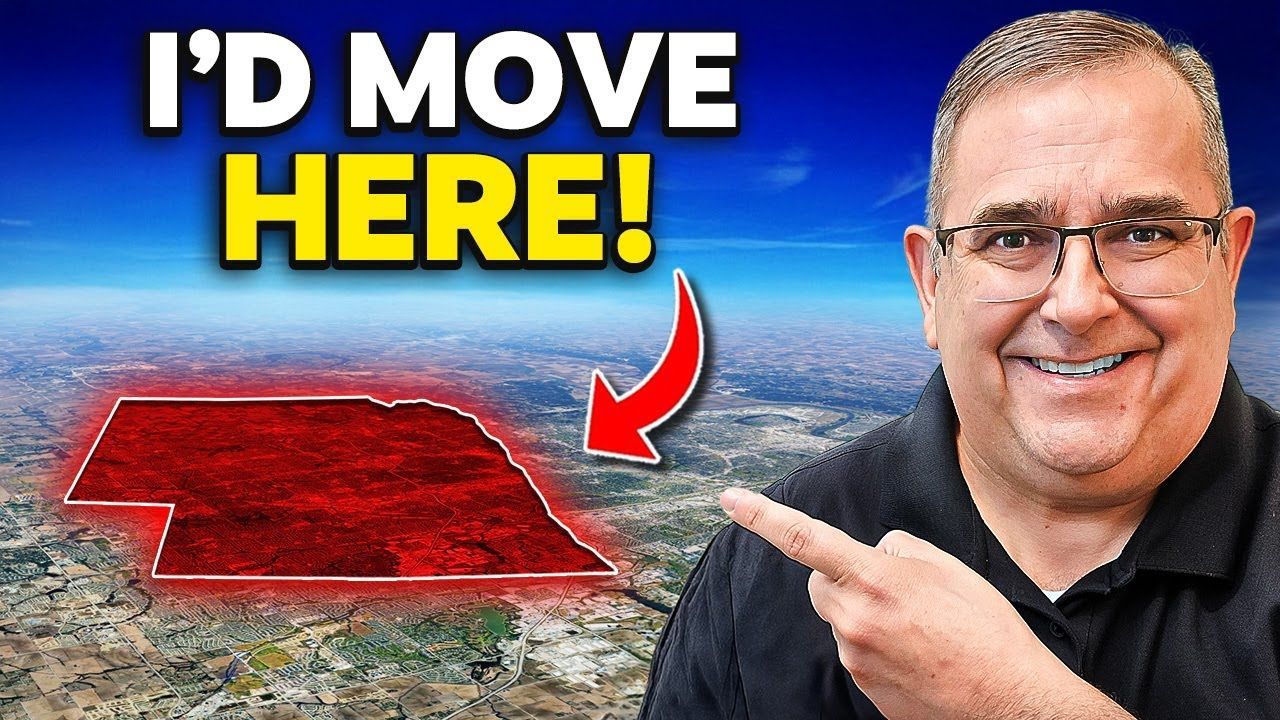 Man pointing to highlighted red area on a map of Nebraska, text reads “I’d Move Here!”
