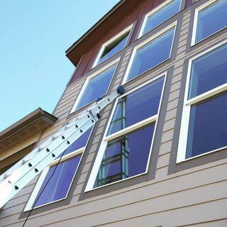 A ladder is attached to the side of a building