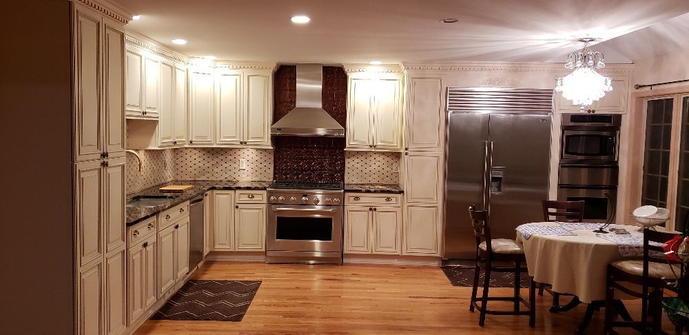 Kitchen Cabinets — White Cabinets in Kitchen in Carmel, NY