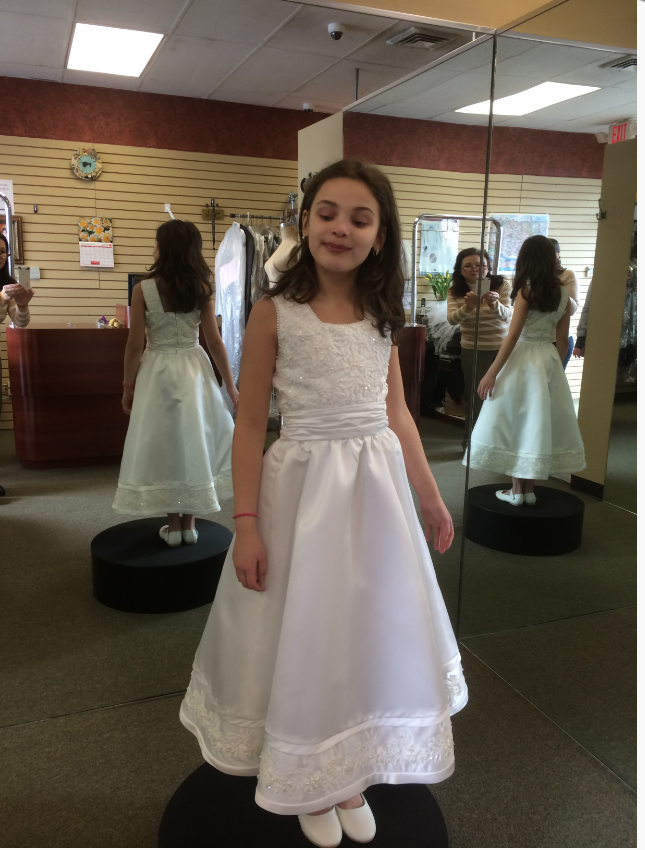 small girl wearing white fork