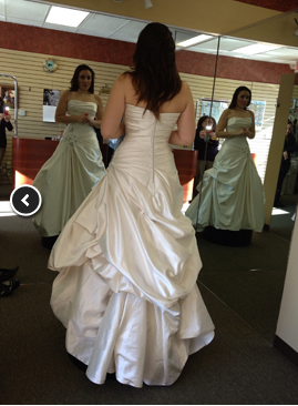 bride wearing modified a-line gown back