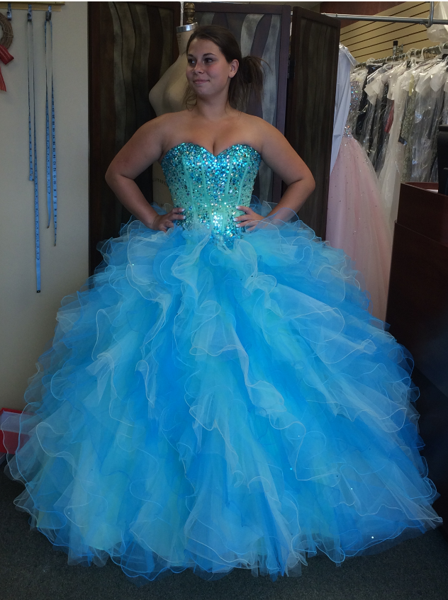 Girl wearing blue ball gown