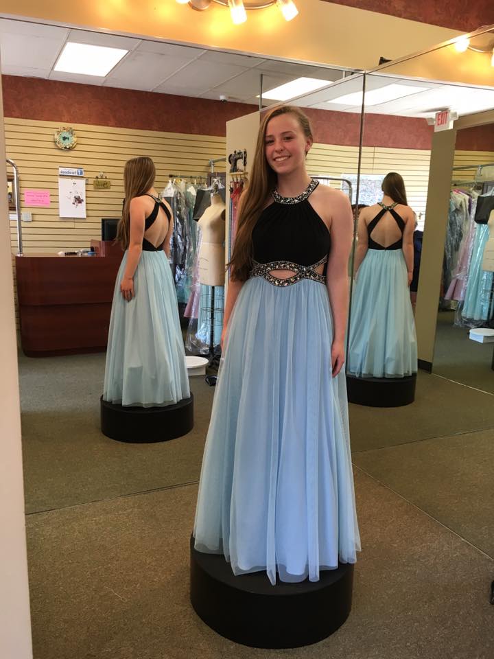 Girl wearing black and blue modified A-line gown