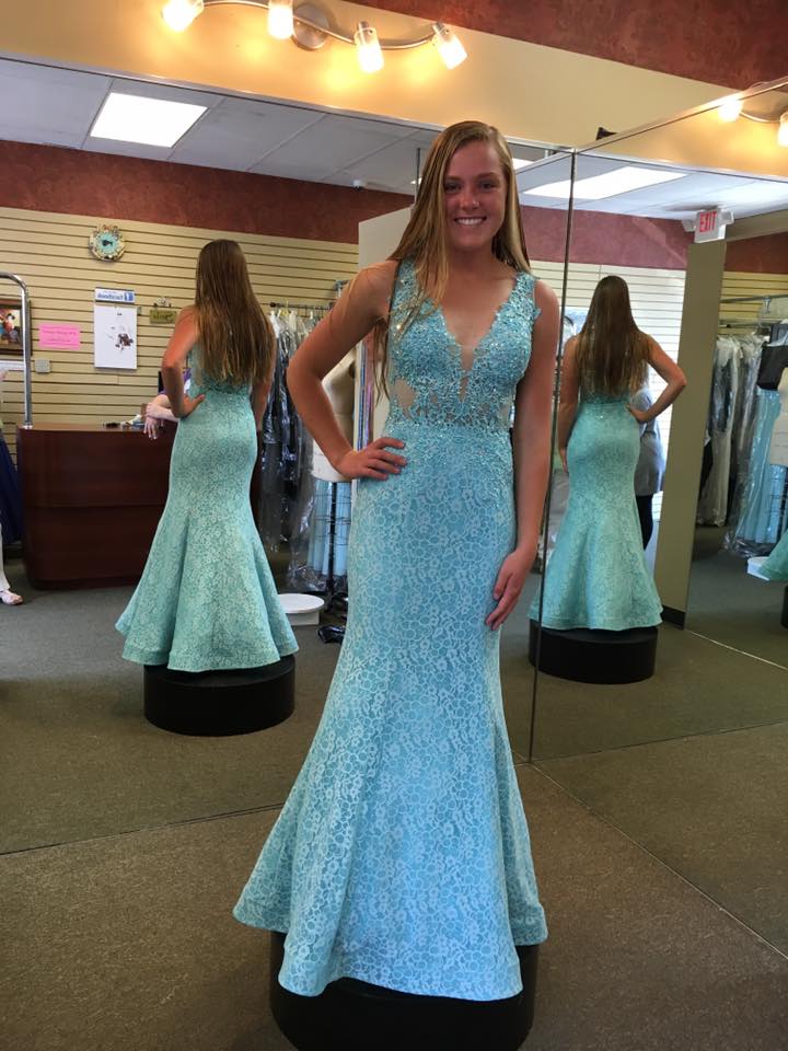Girl wearing sky blue lace prom dress