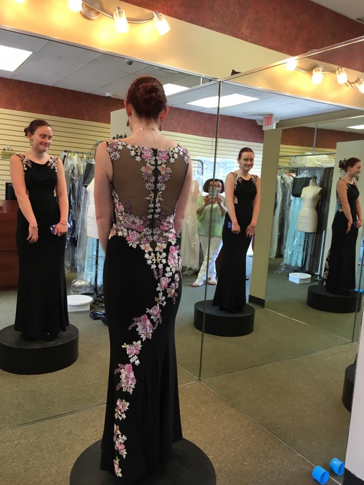 Girl wearing black prom dress