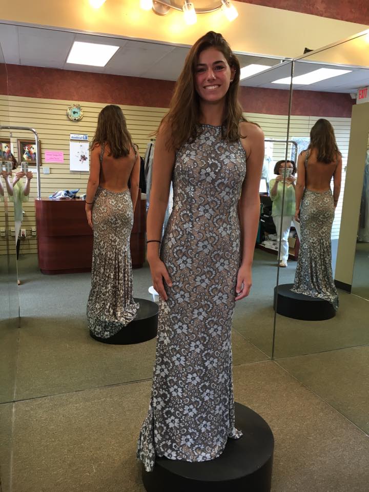 Girl wearing ash with flowers  prom dress