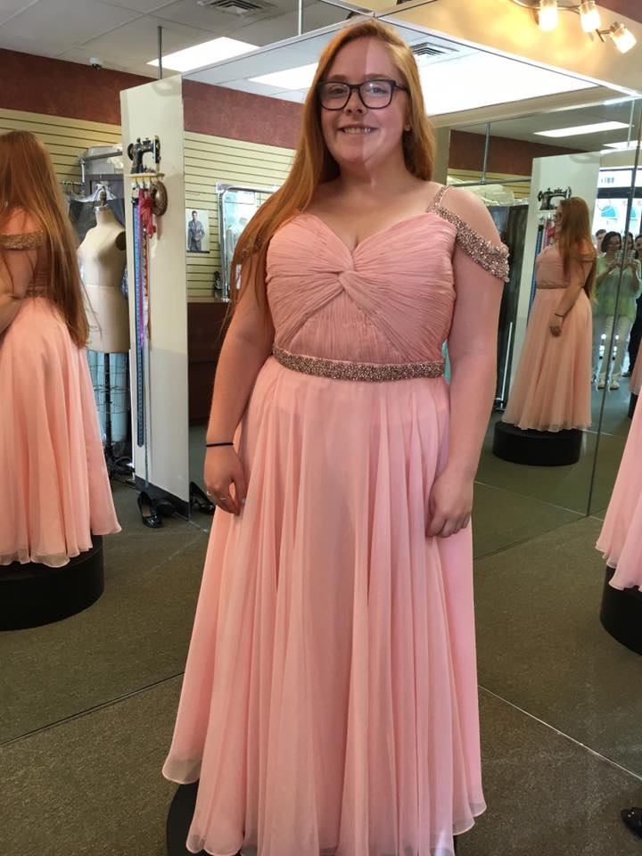 girl wearing baby pink gown