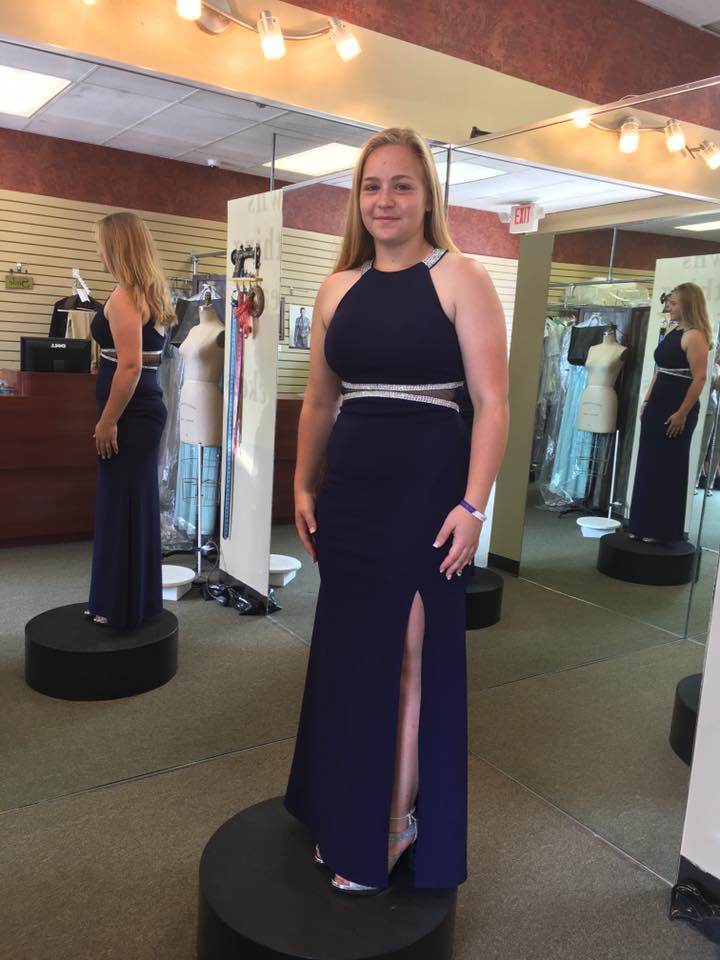 Girl wearing blue with side cut  prom dress