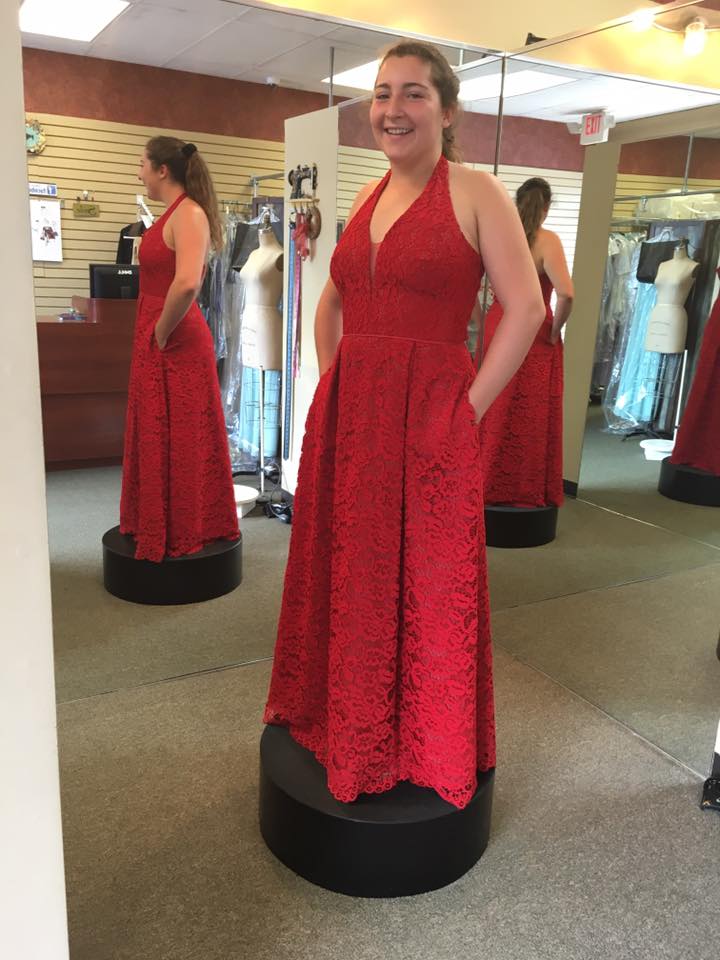 Girl wearing red prom dress