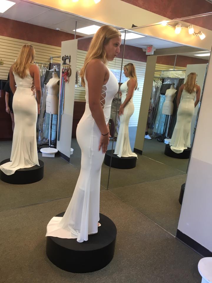 Girl wearing white mermaid  gown