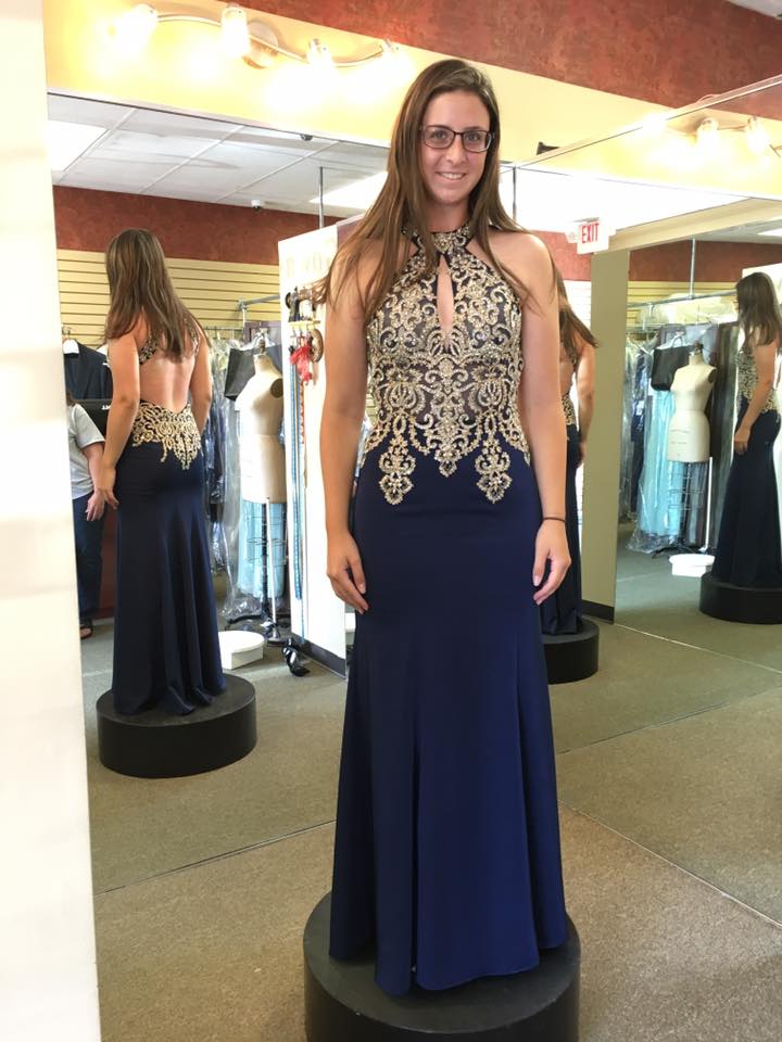 Girl wearing blue embodied prom dress