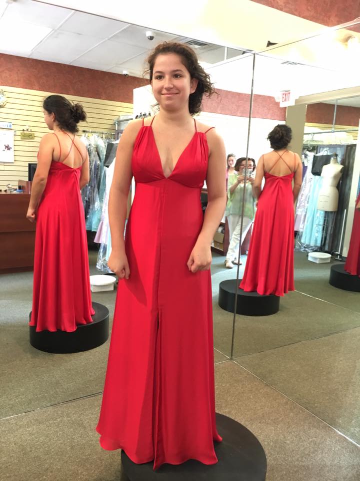 Girl wearing red  V-neck sheath gown