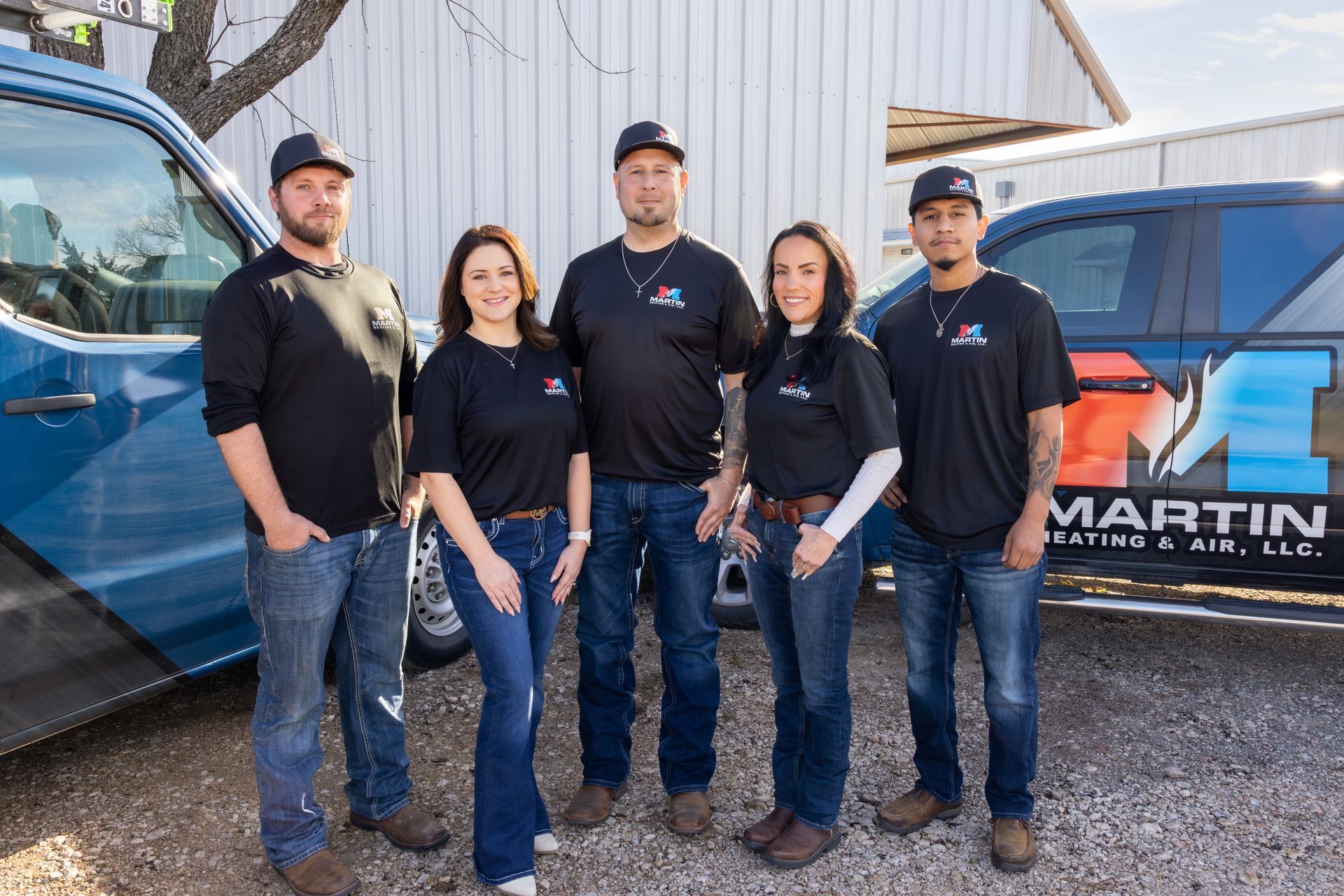 A living room with a couch , table , and plants.